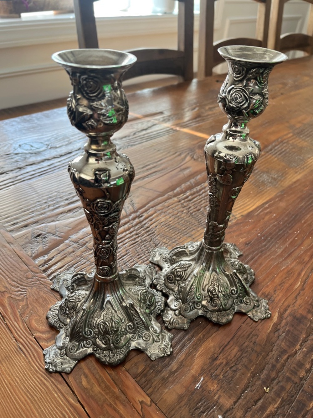 Ornate Floral-Embossed Silver Candle Holder Pair